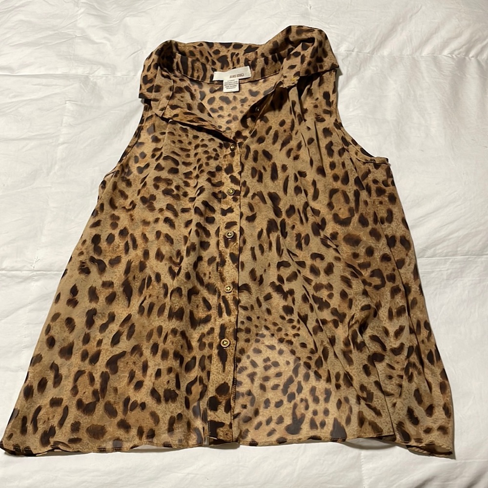 Polyester leopard collared tank with bronze coloured buttons.